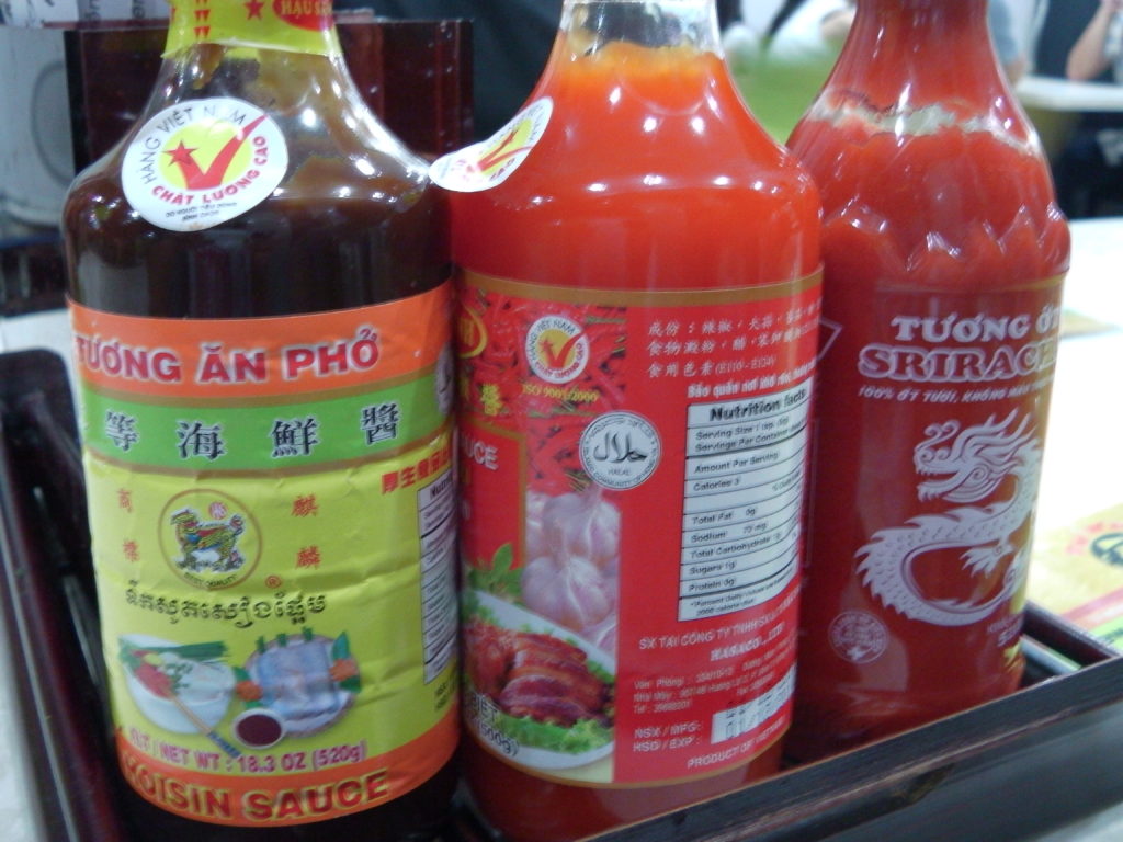 a group of bottles of sauce
