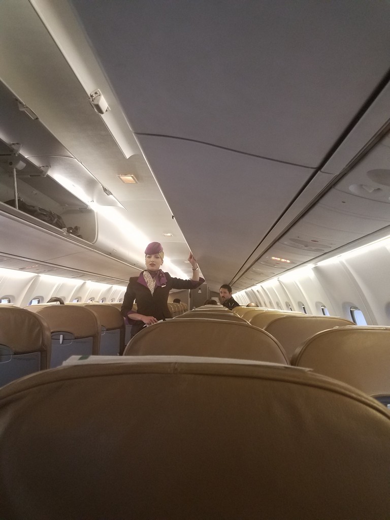 a person standing on the plane