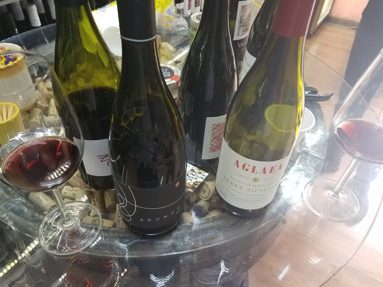 a group of wine bottles on a table