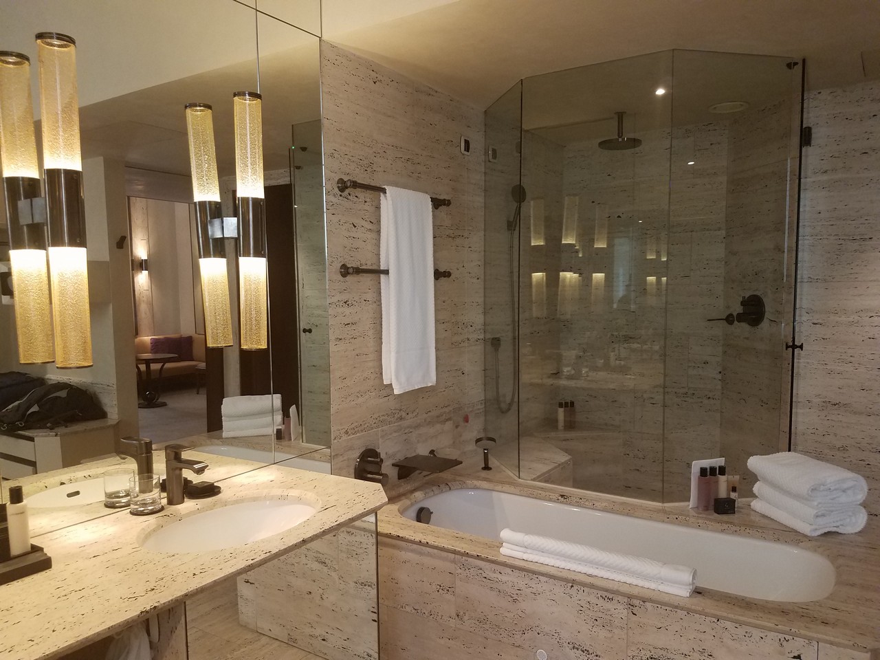 a bathroom with a large shower and tub