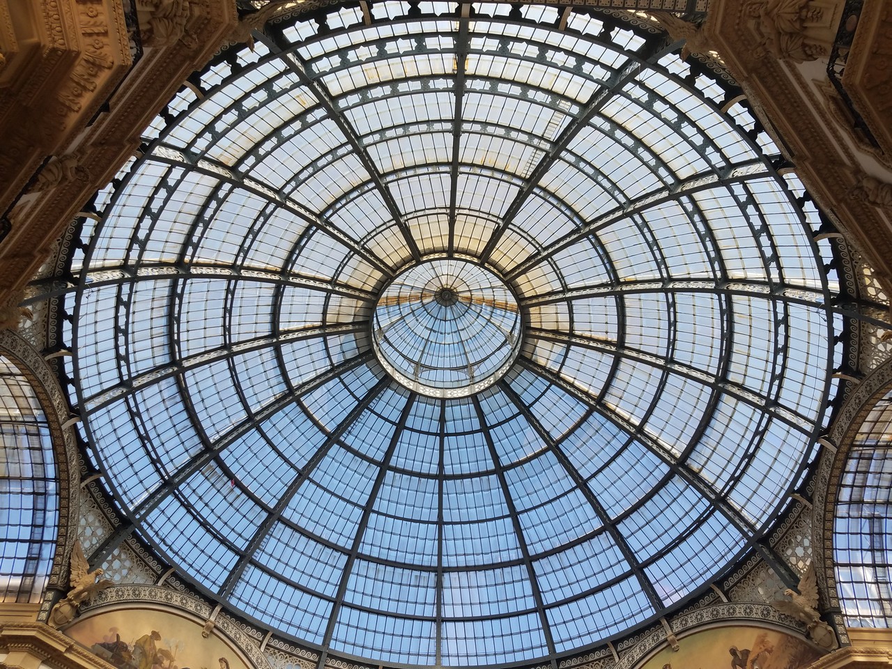 a glass dome with a circular roof