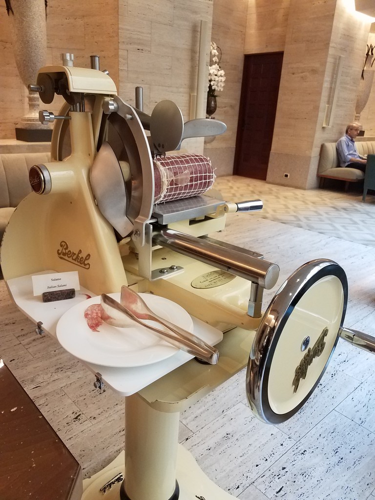 a meat slicer in a room