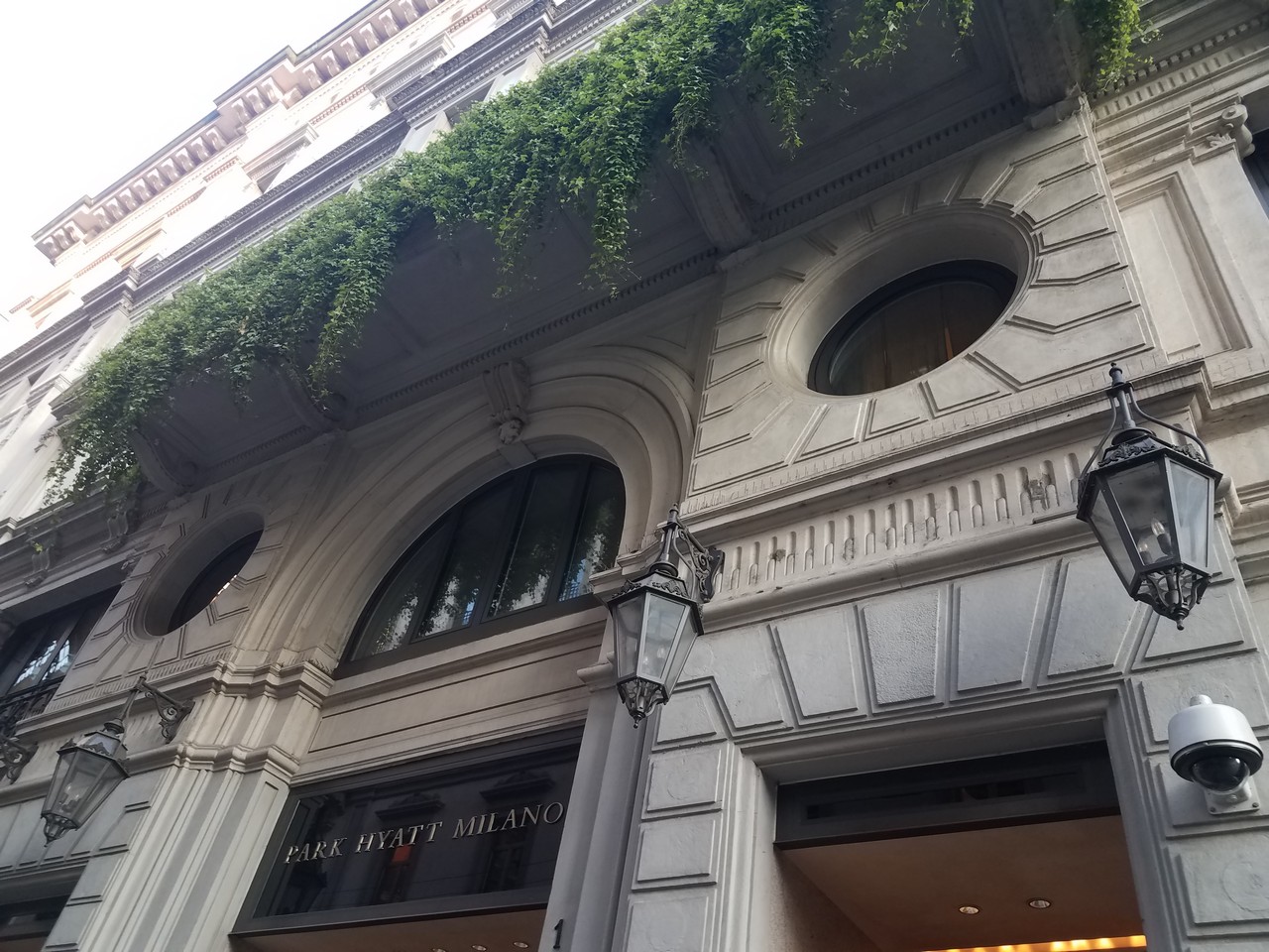 a building with ivy growing on the side
