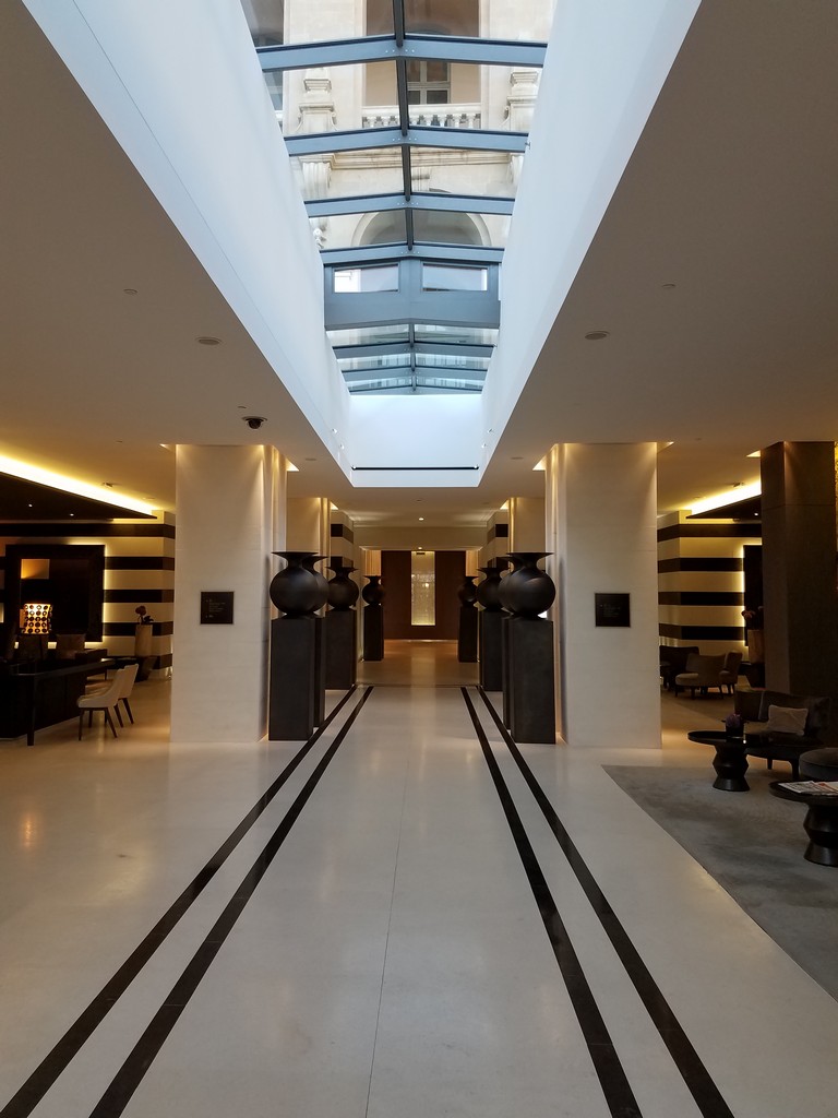a hallway with a skylight