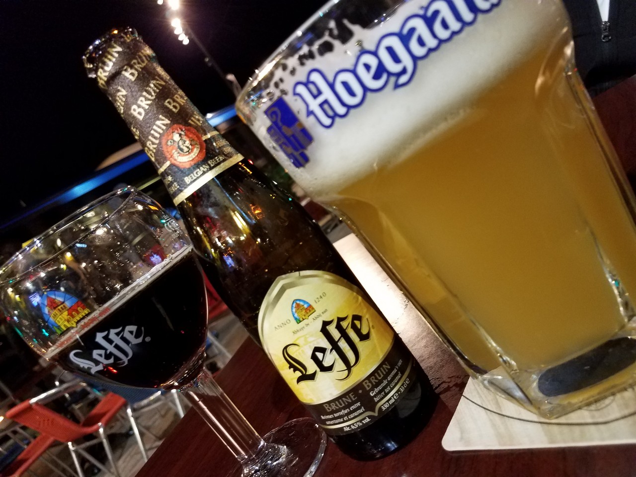 a bottle of beer and a glass of beer