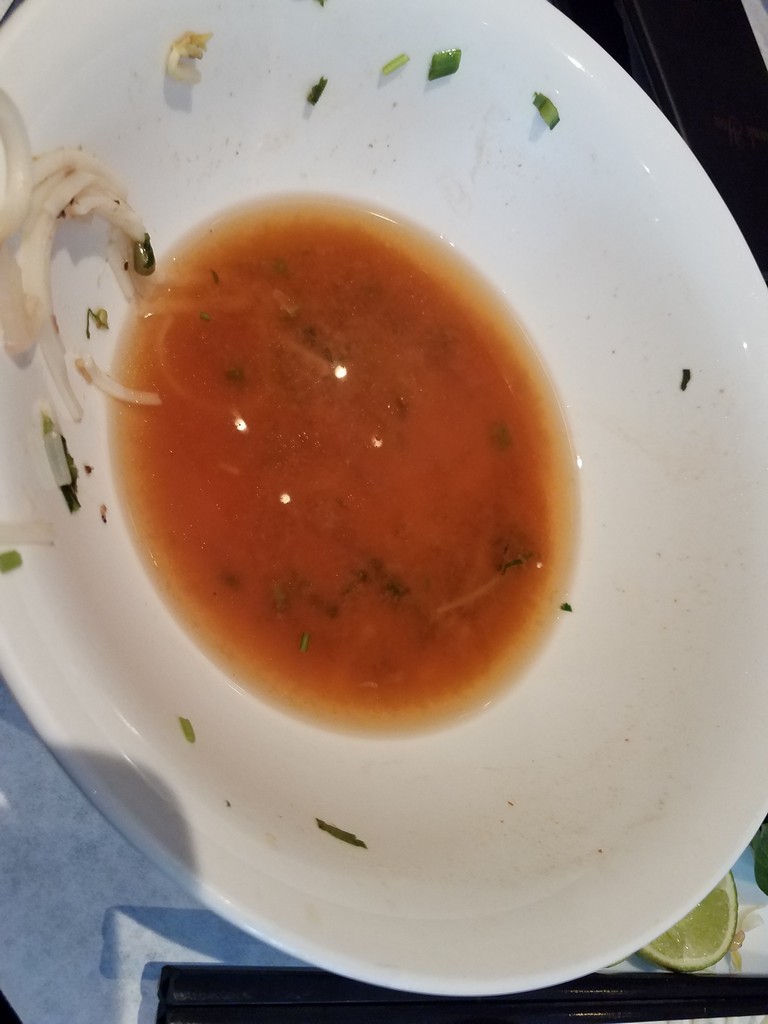 a bowl of soup with noodles