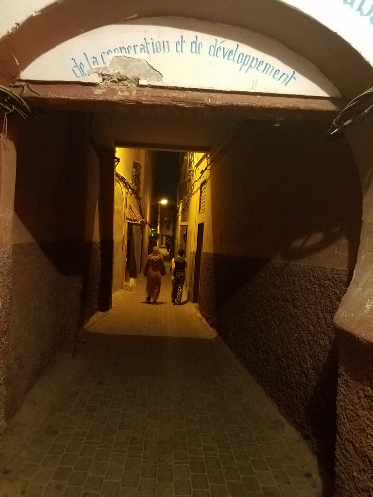a person walking in a tunnel