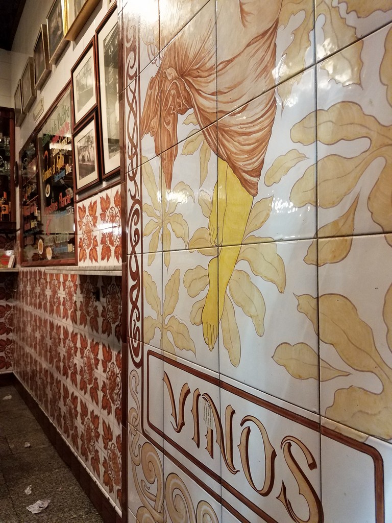 a wall with tiles on it