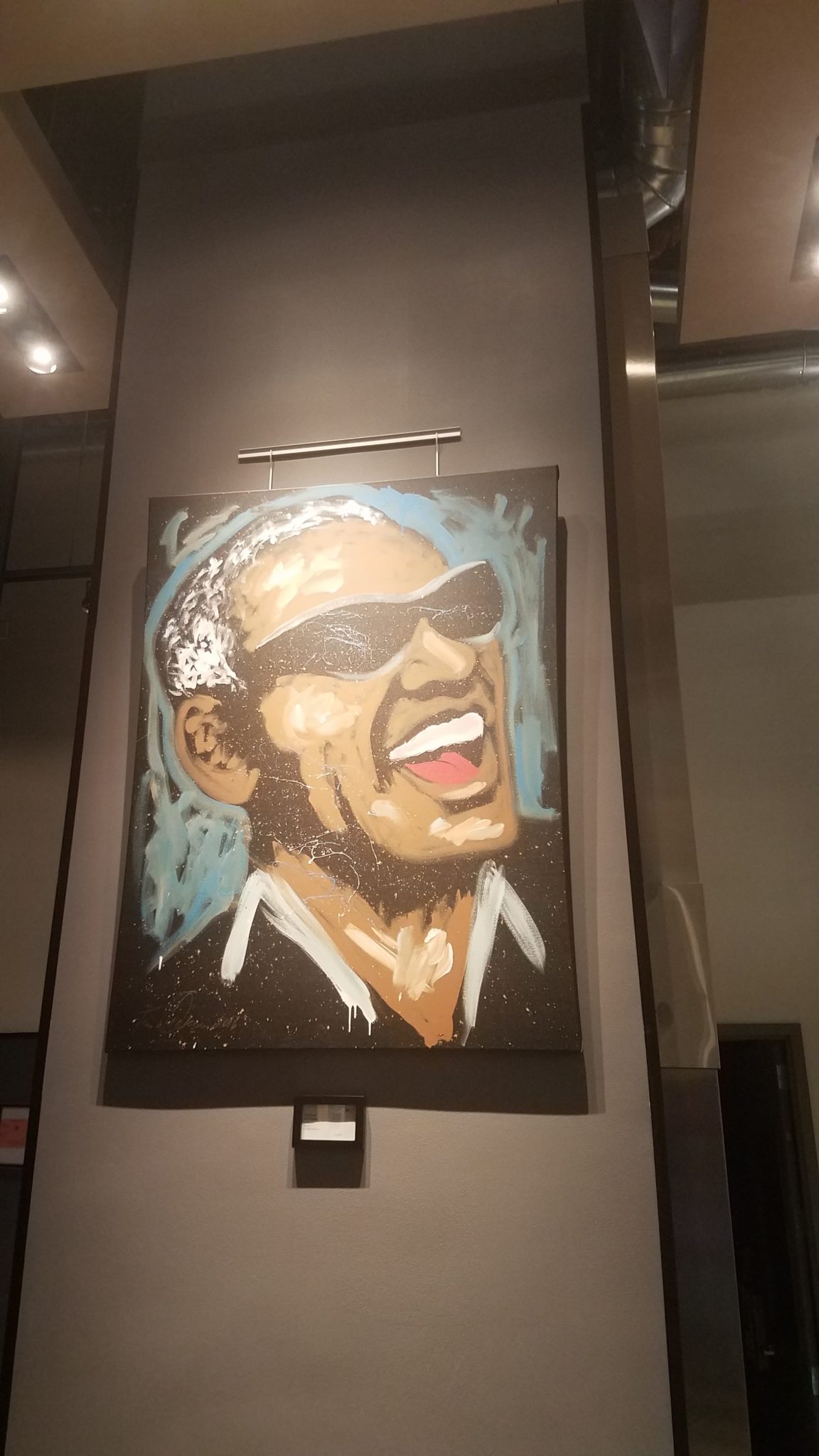 a painting of a man wearing sunglasses