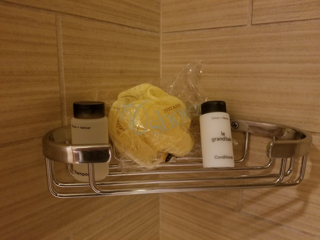 a shower accessories on a shelf