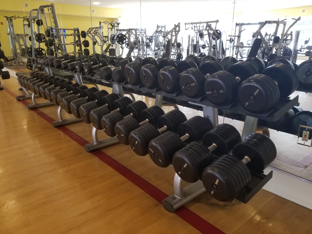 a row of weights on a rack