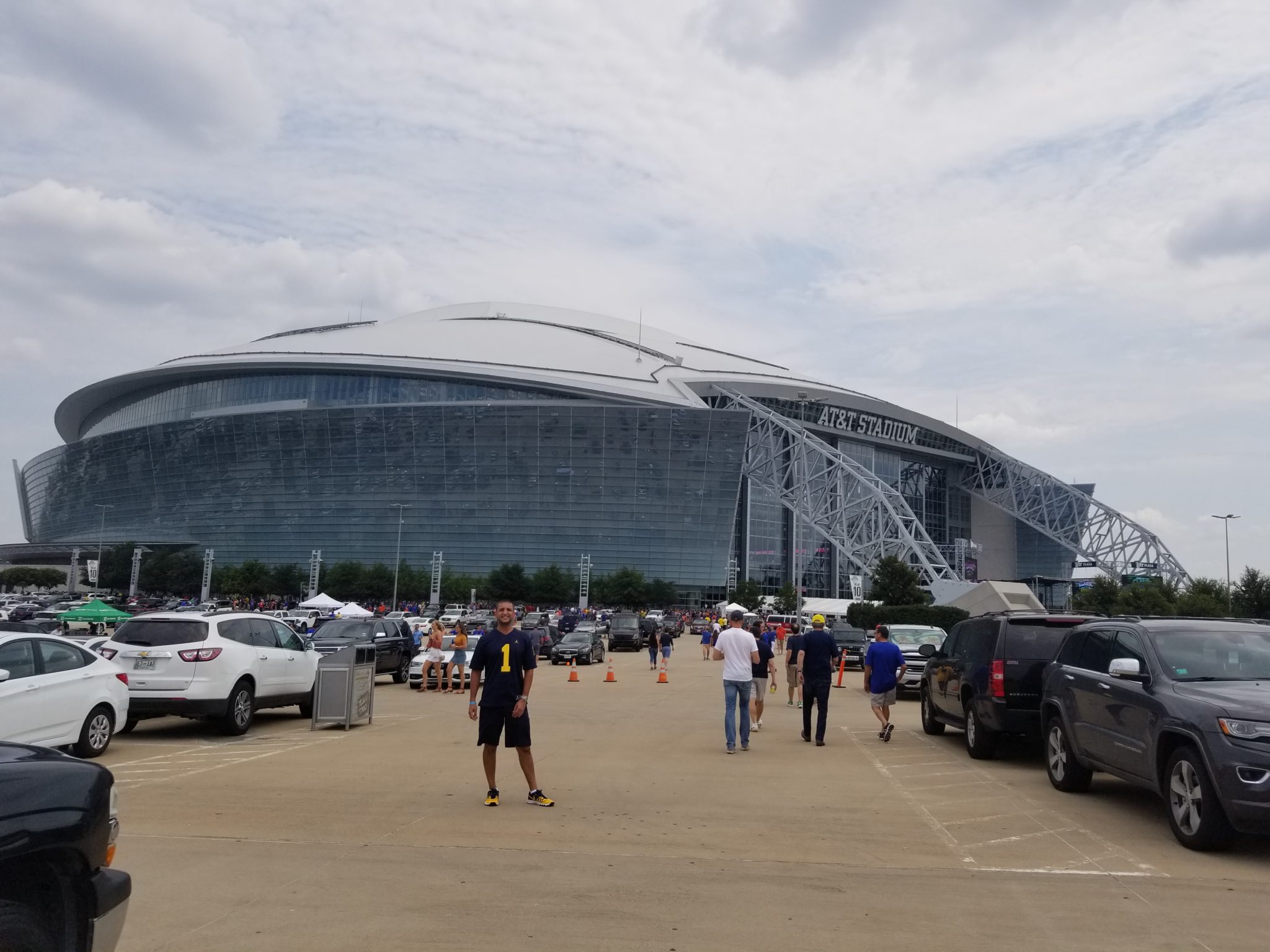 a group of people outside of a stadium
