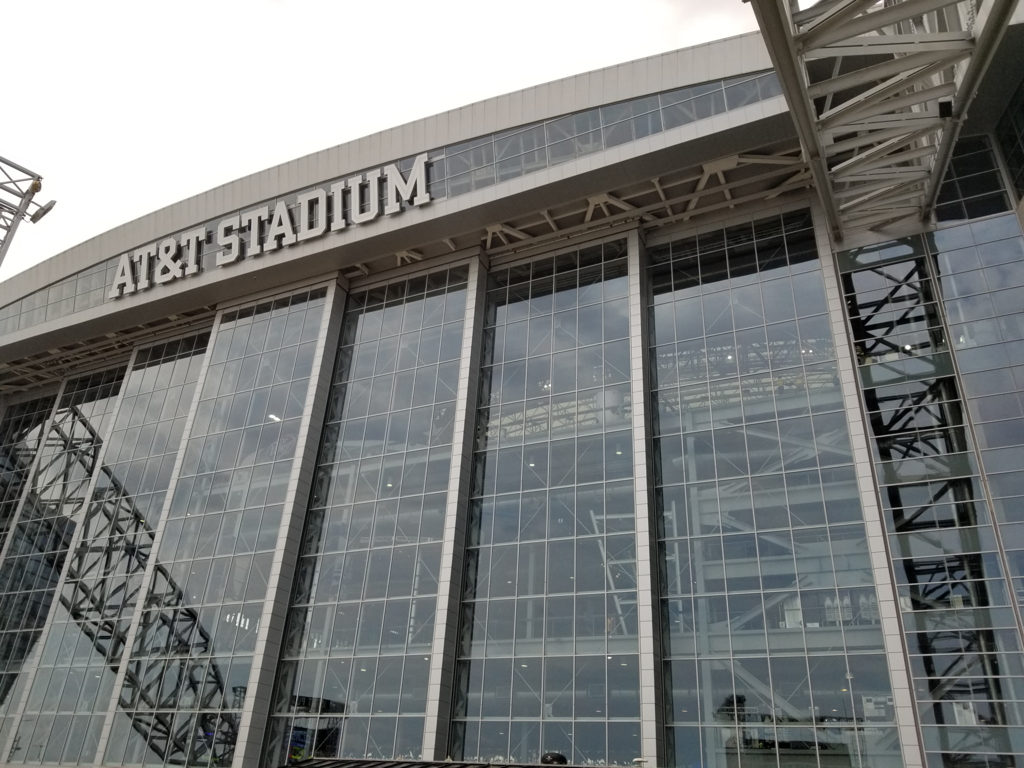 a large stadium with a large metal structure