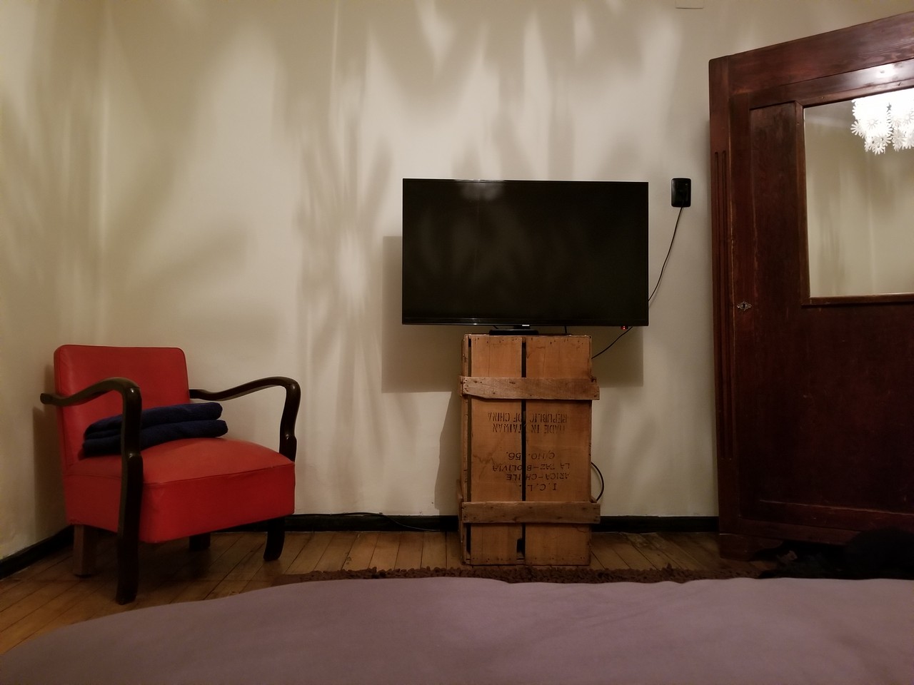 a tv on a box in a room