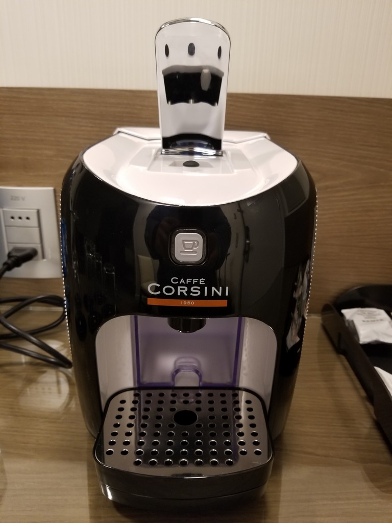 a black and white coffee machine