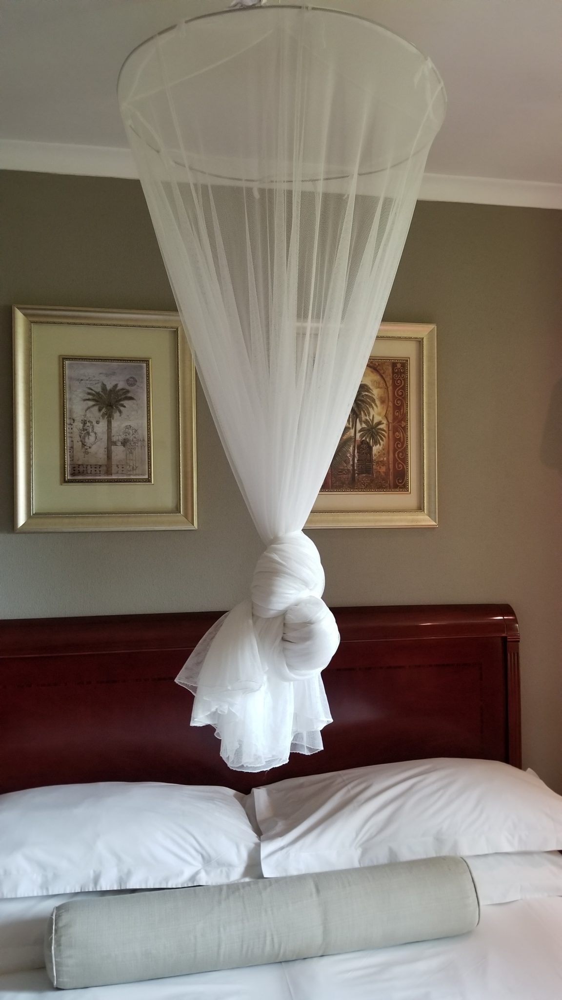 a white curtain from a bed
