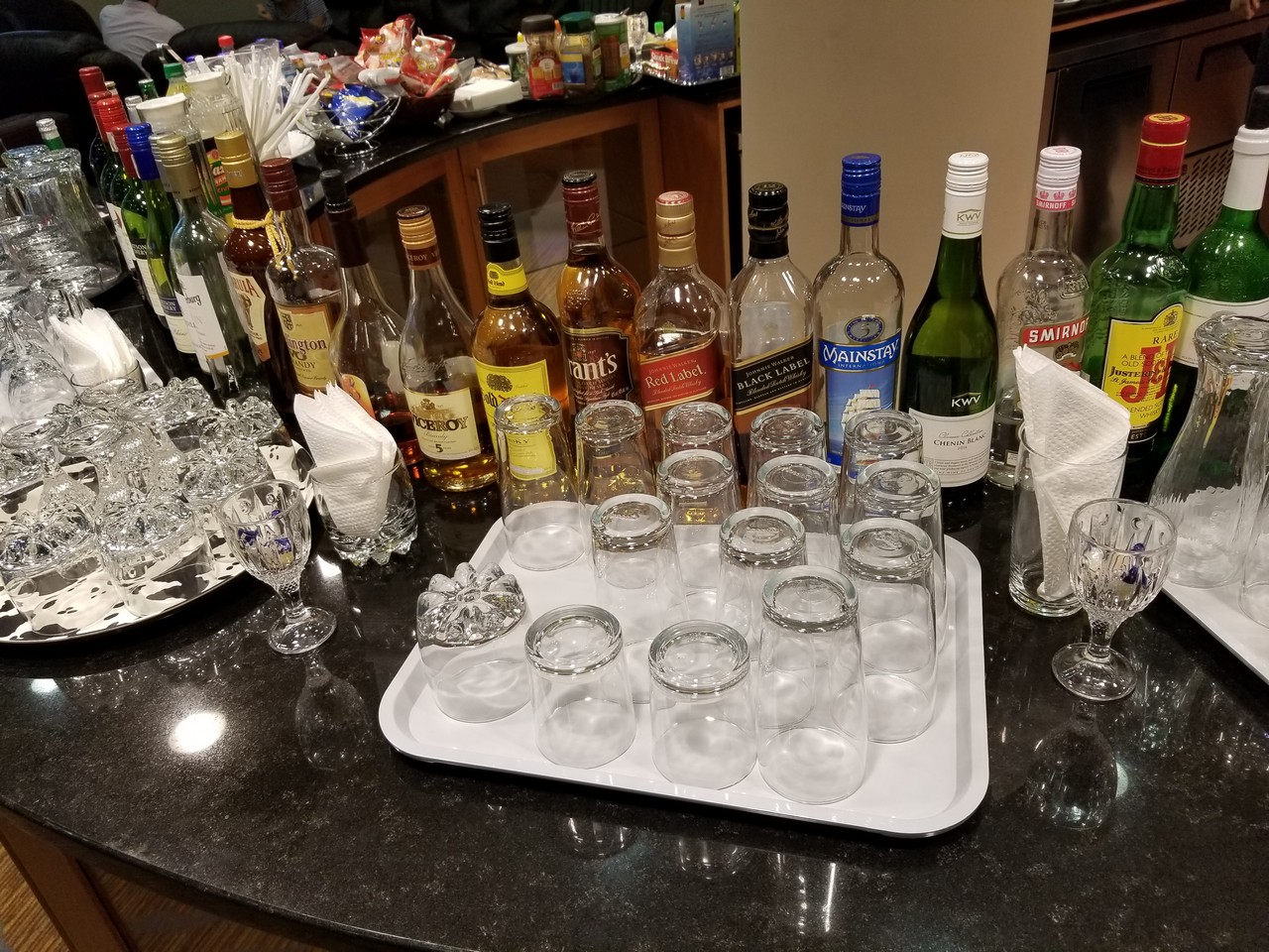 a group of glasses and bottles on a table