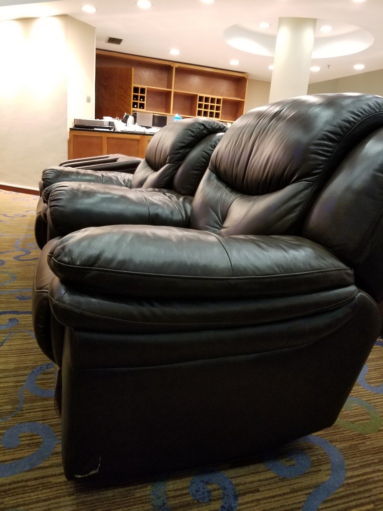 a black leather chairs in a room
