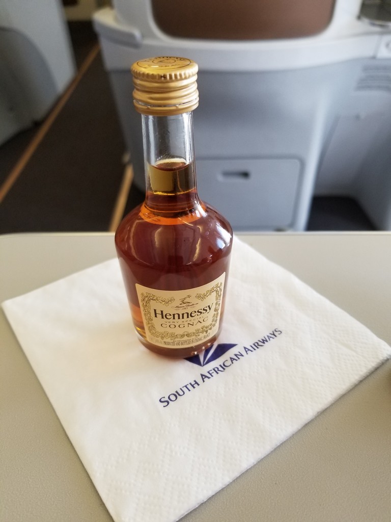 a bottle of alcohol on a napkin