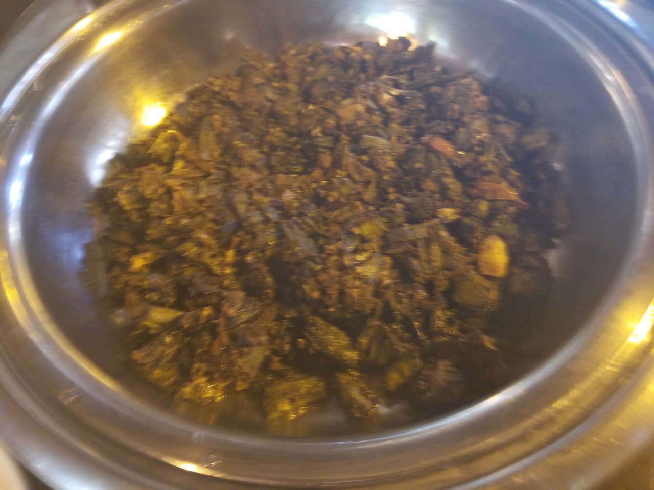 a bowl of food on a stove