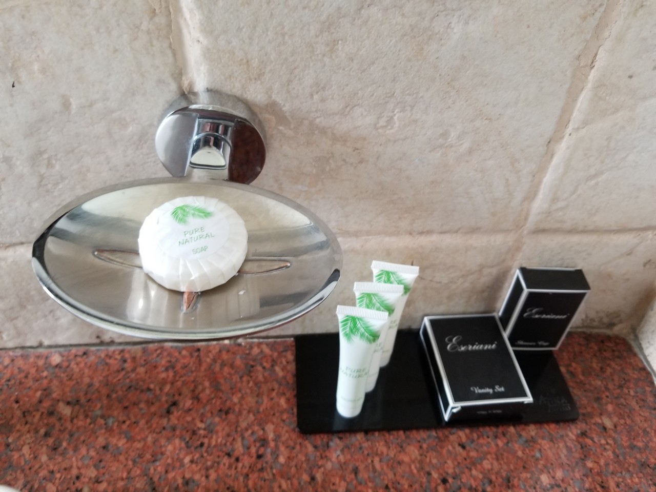 a soap and toiletries on a stand