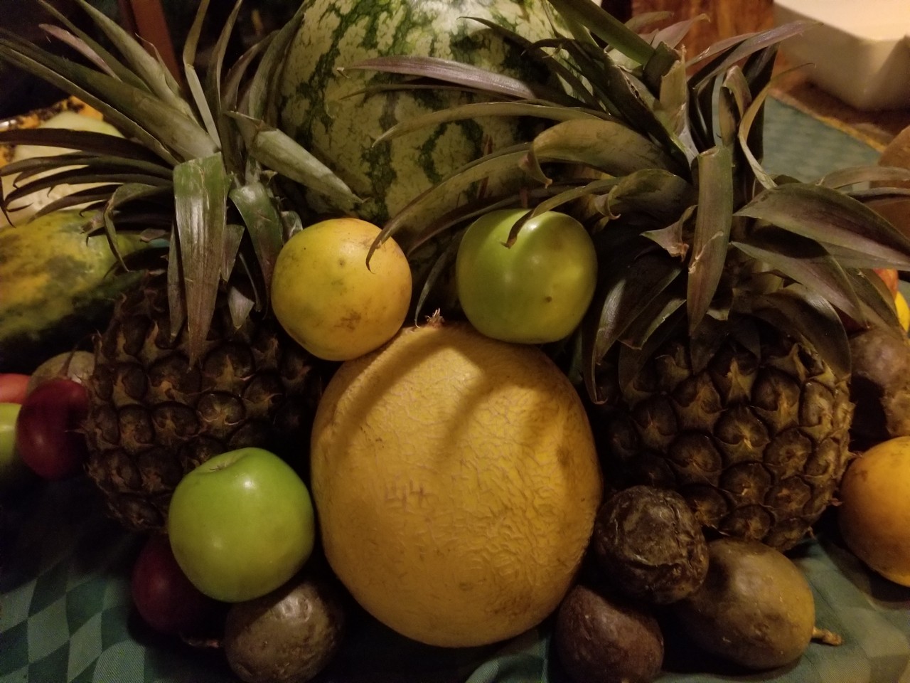 a group of fruits on a table
