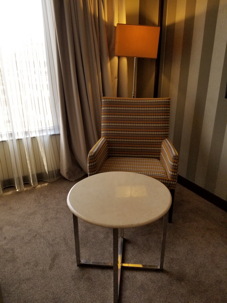 a chair and a table in a room