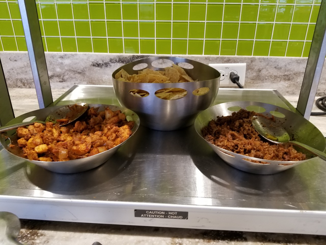 bowls of food in bowls on a counter