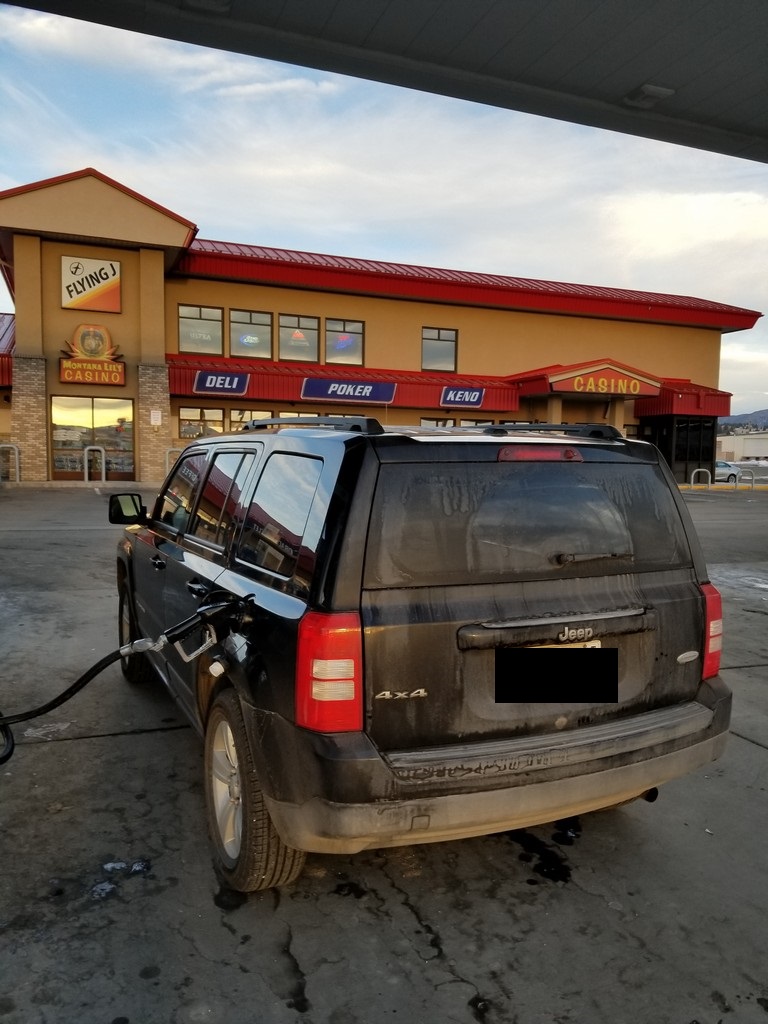 a car at a gas station