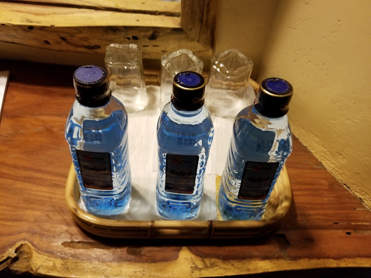 a tray of bottles on a table