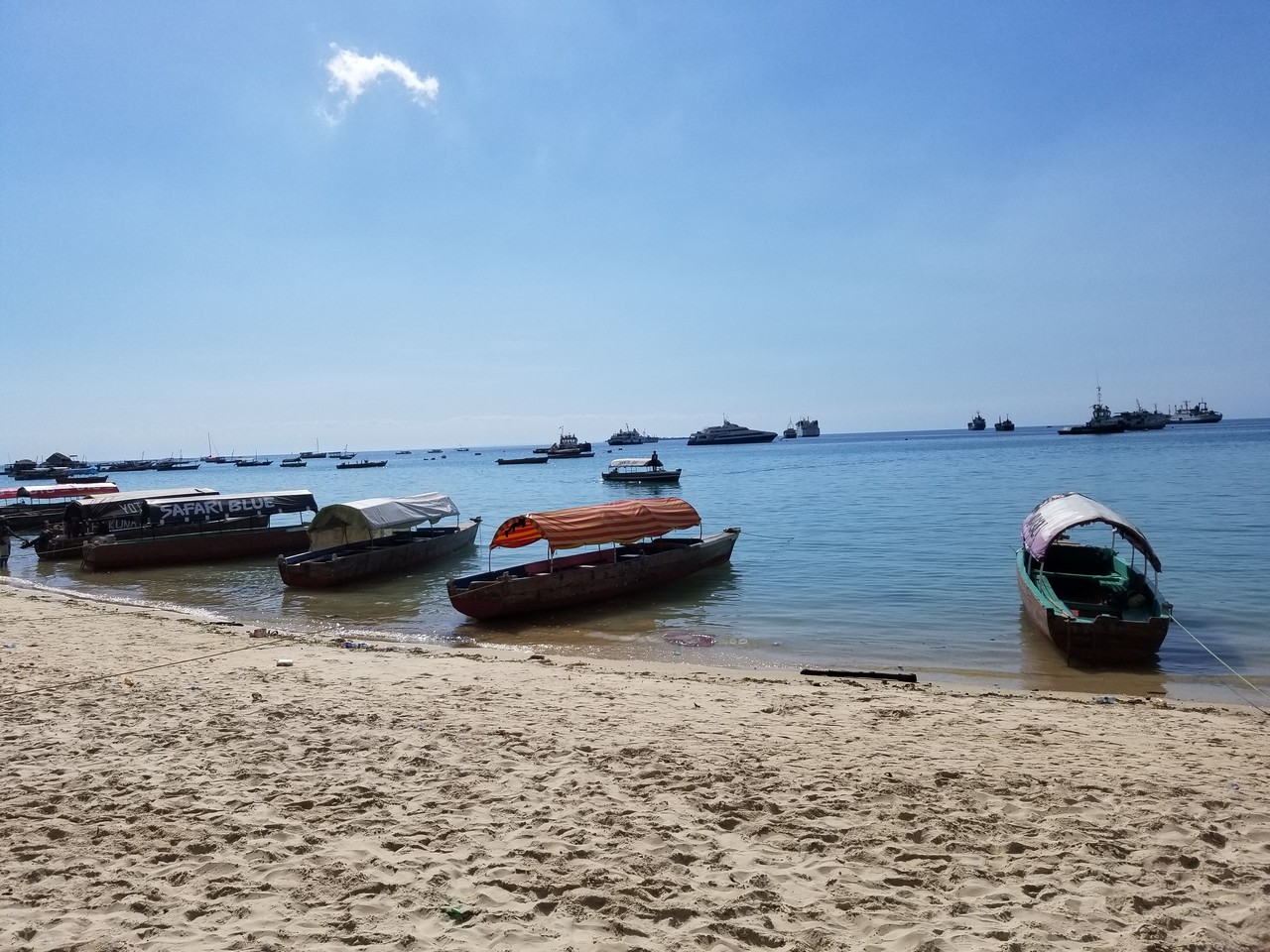 boats on a beach with boats