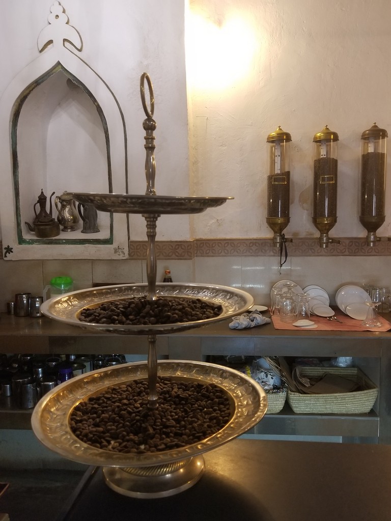a two tiered trays with coffee beans
