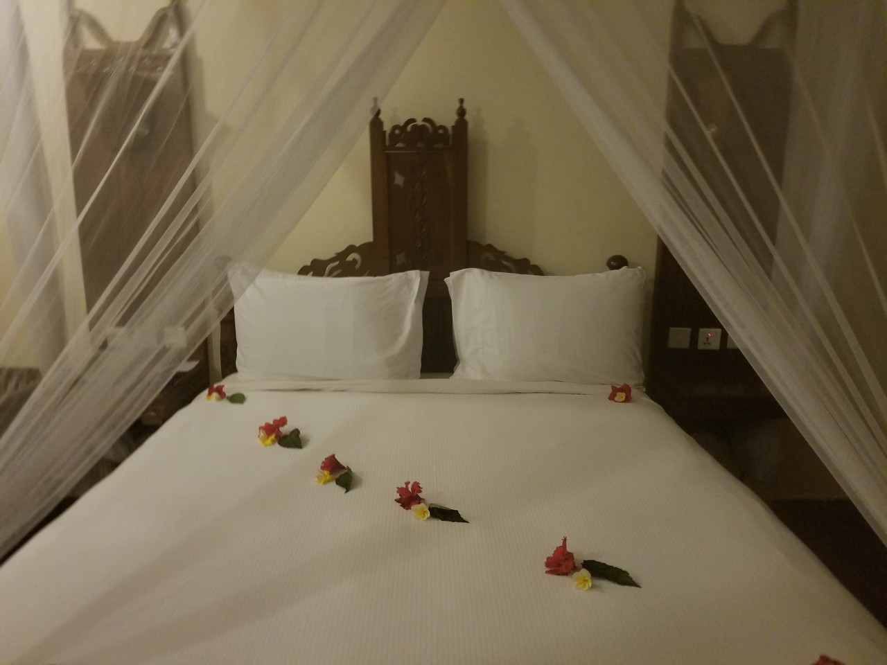 a bed with flowers on it