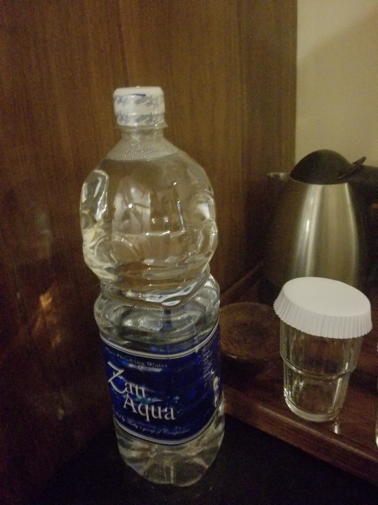 a bottle of water on a table