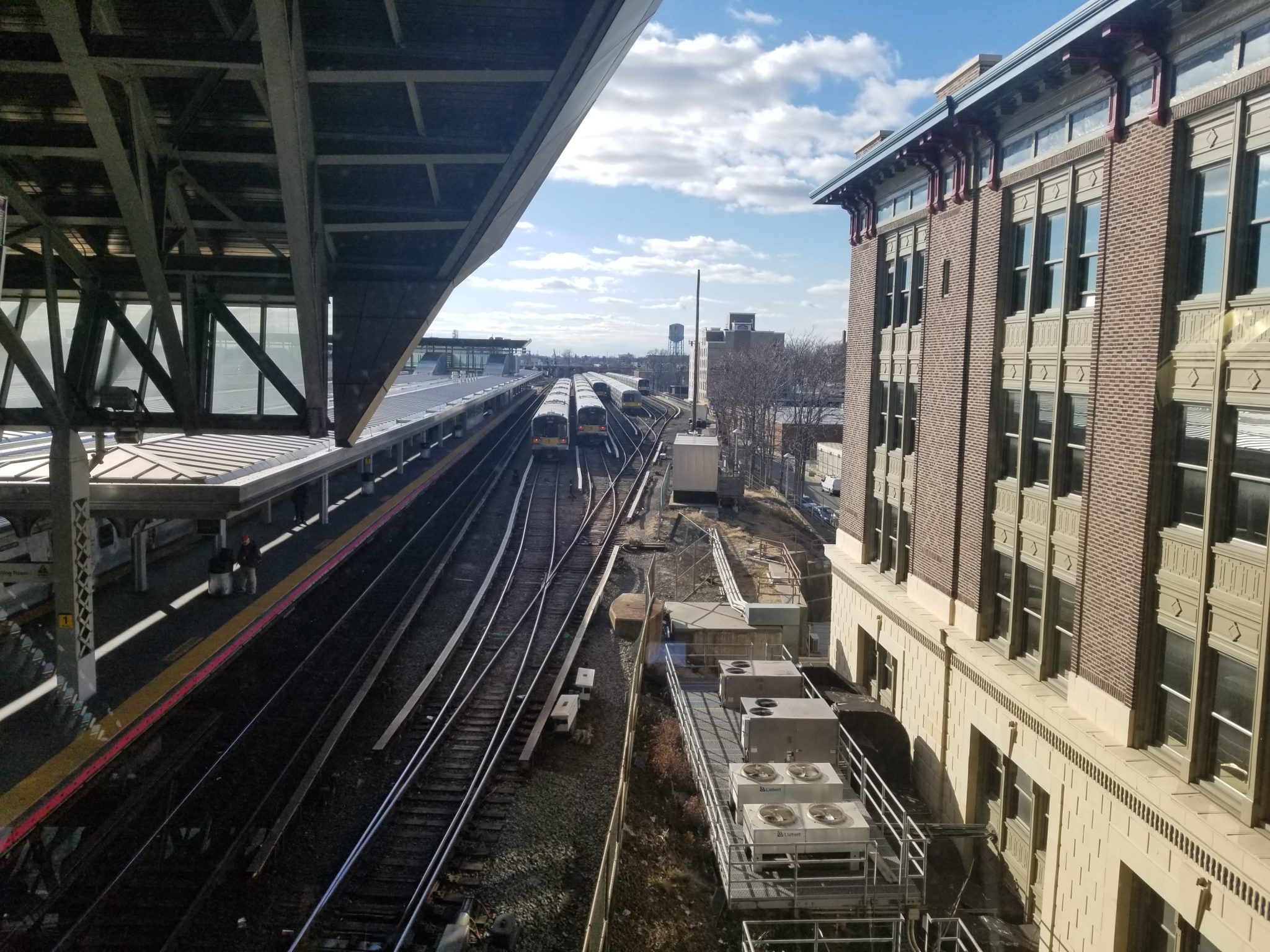 train tracks next to buildings