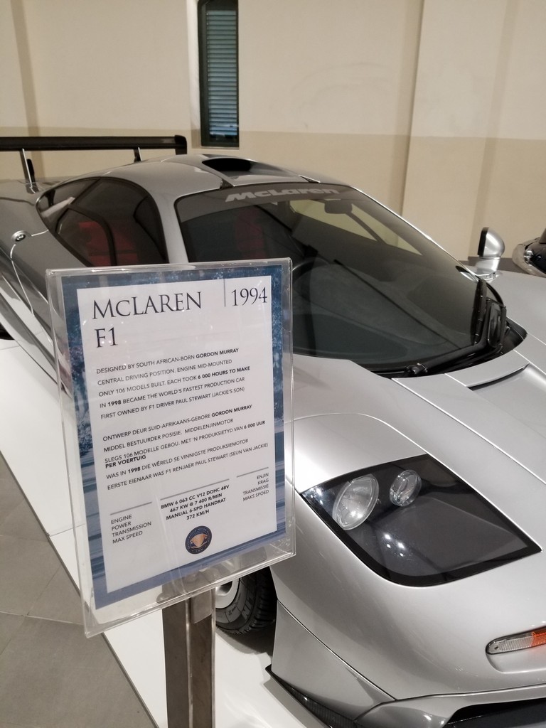 a car parked in a showroom