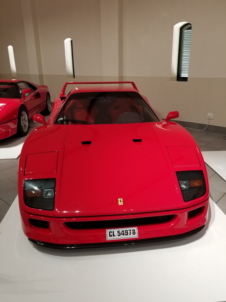 a red sports car on display