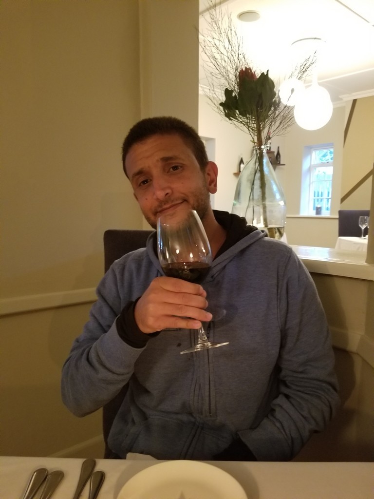 a man holding a wine glass
