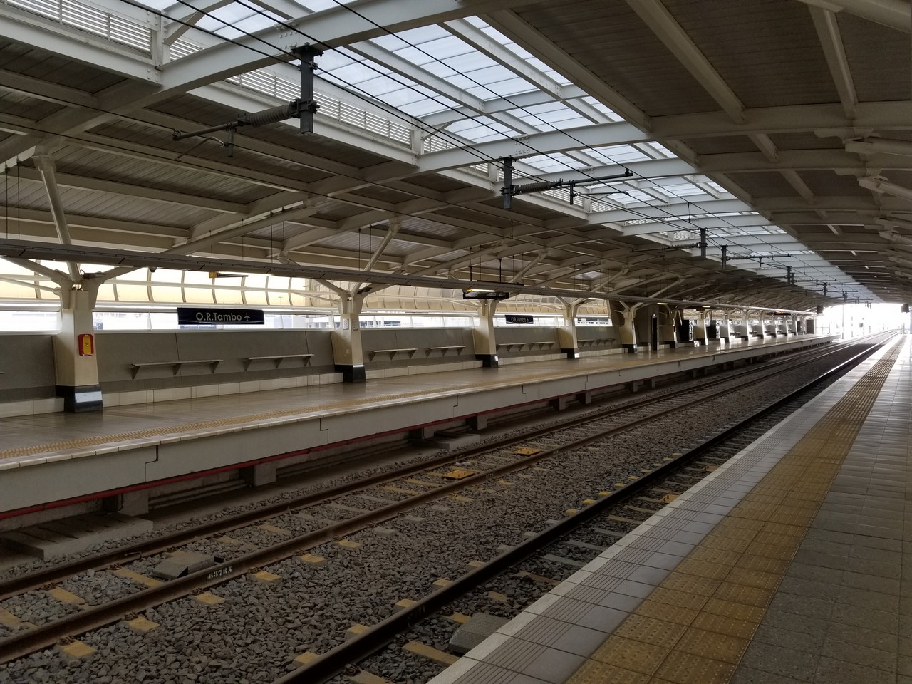 a train station with a platform and a platform