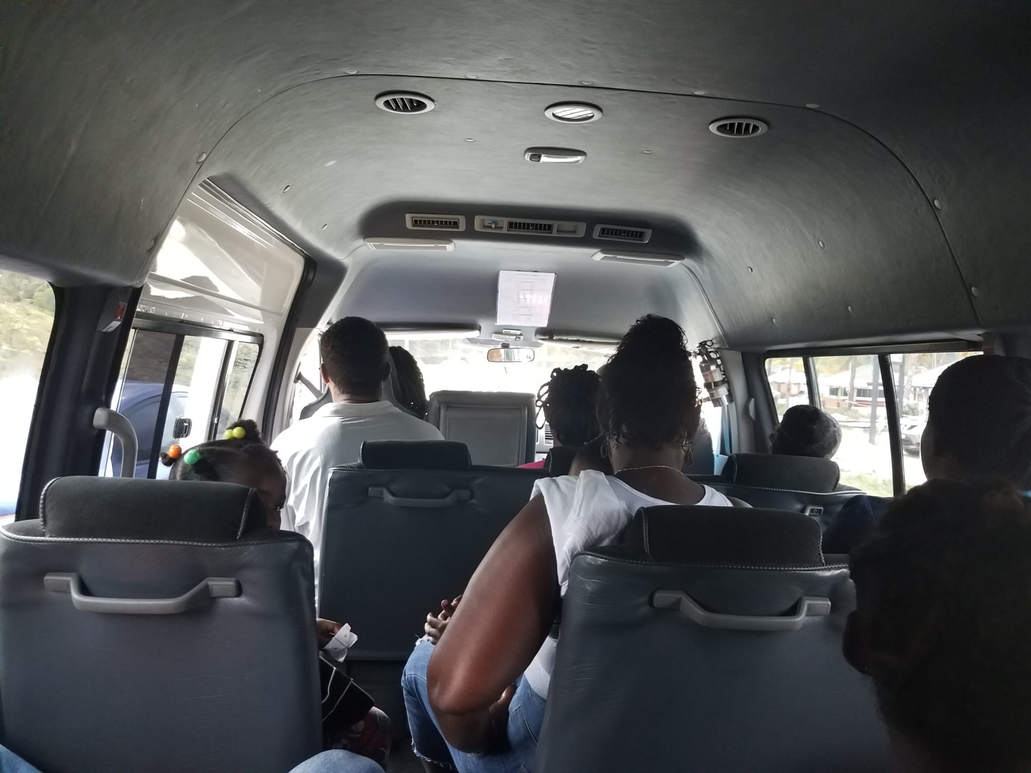 A typical mini bus with typical people in Trinidad 