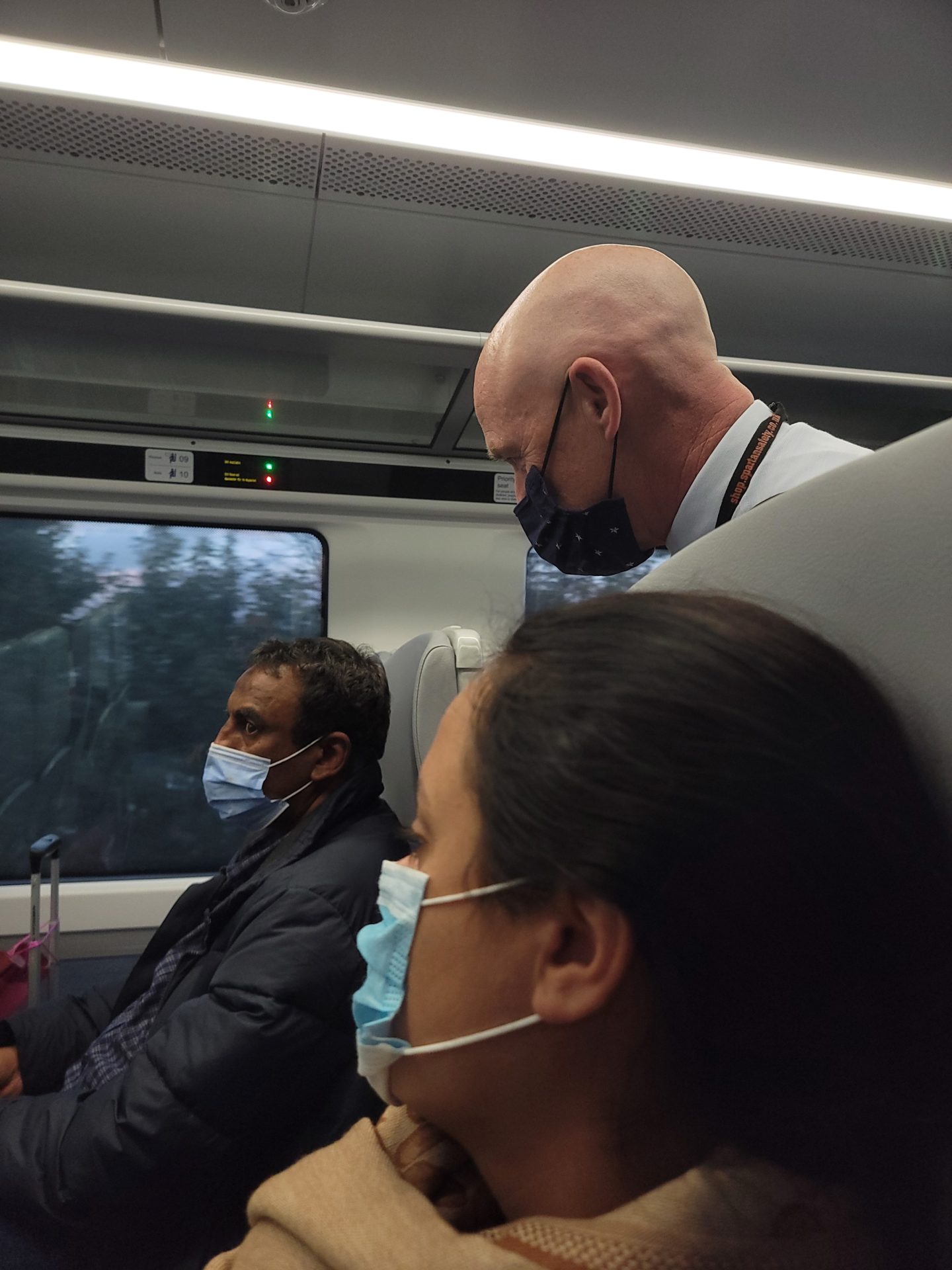 a group of people wearing face masks