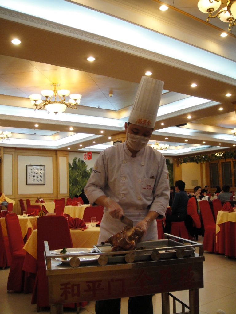 a chef preparing food in a restaurant