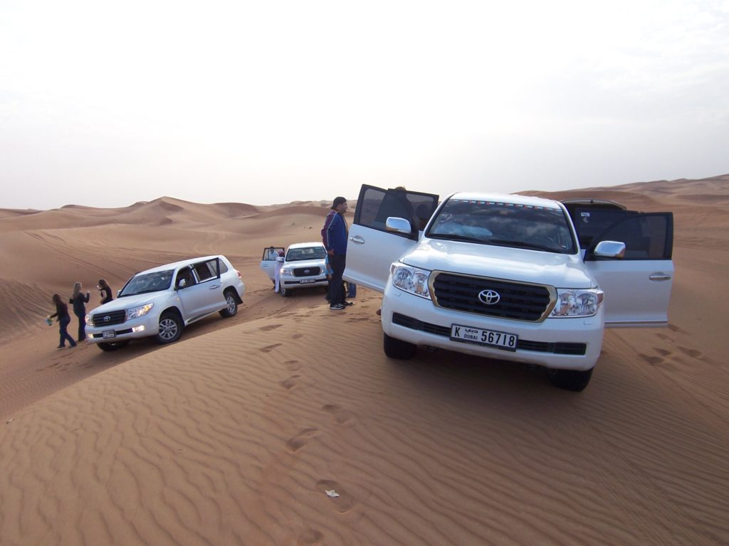 a group of cars in the desert