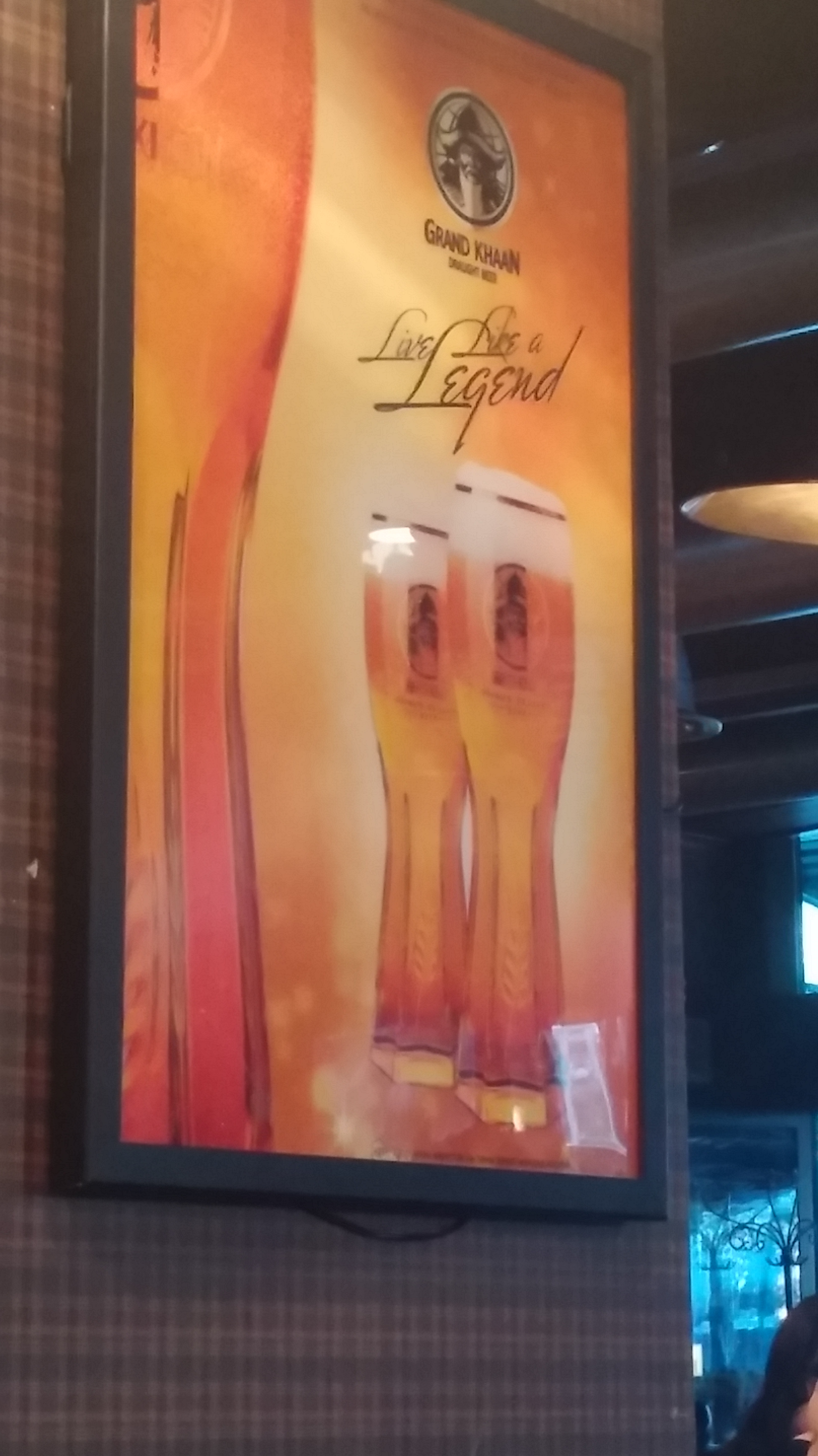 a poster of beer on a wall