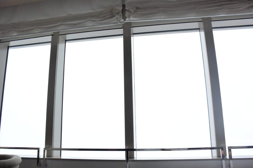 a window with a white shade