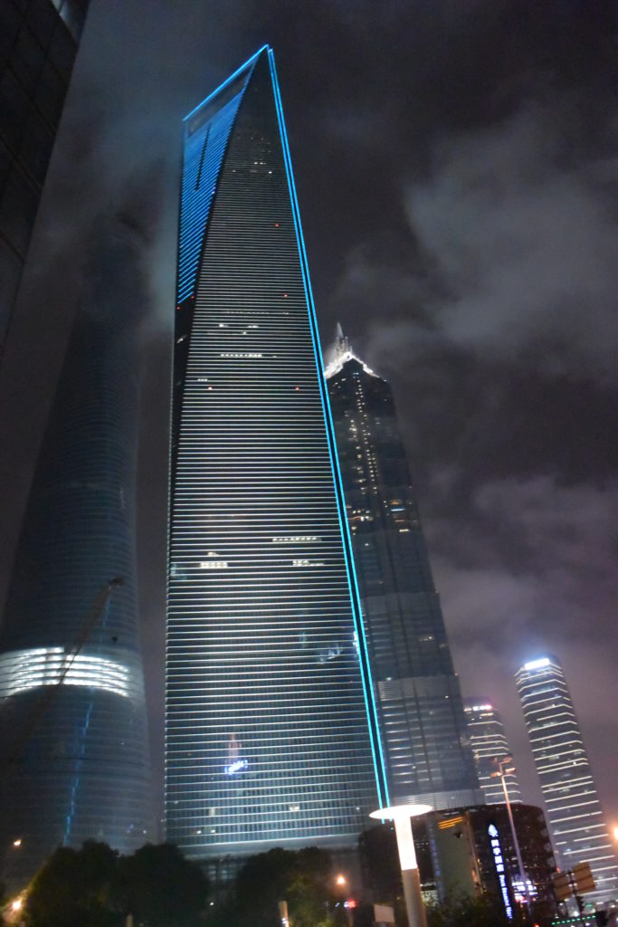 a tall building with a blue light