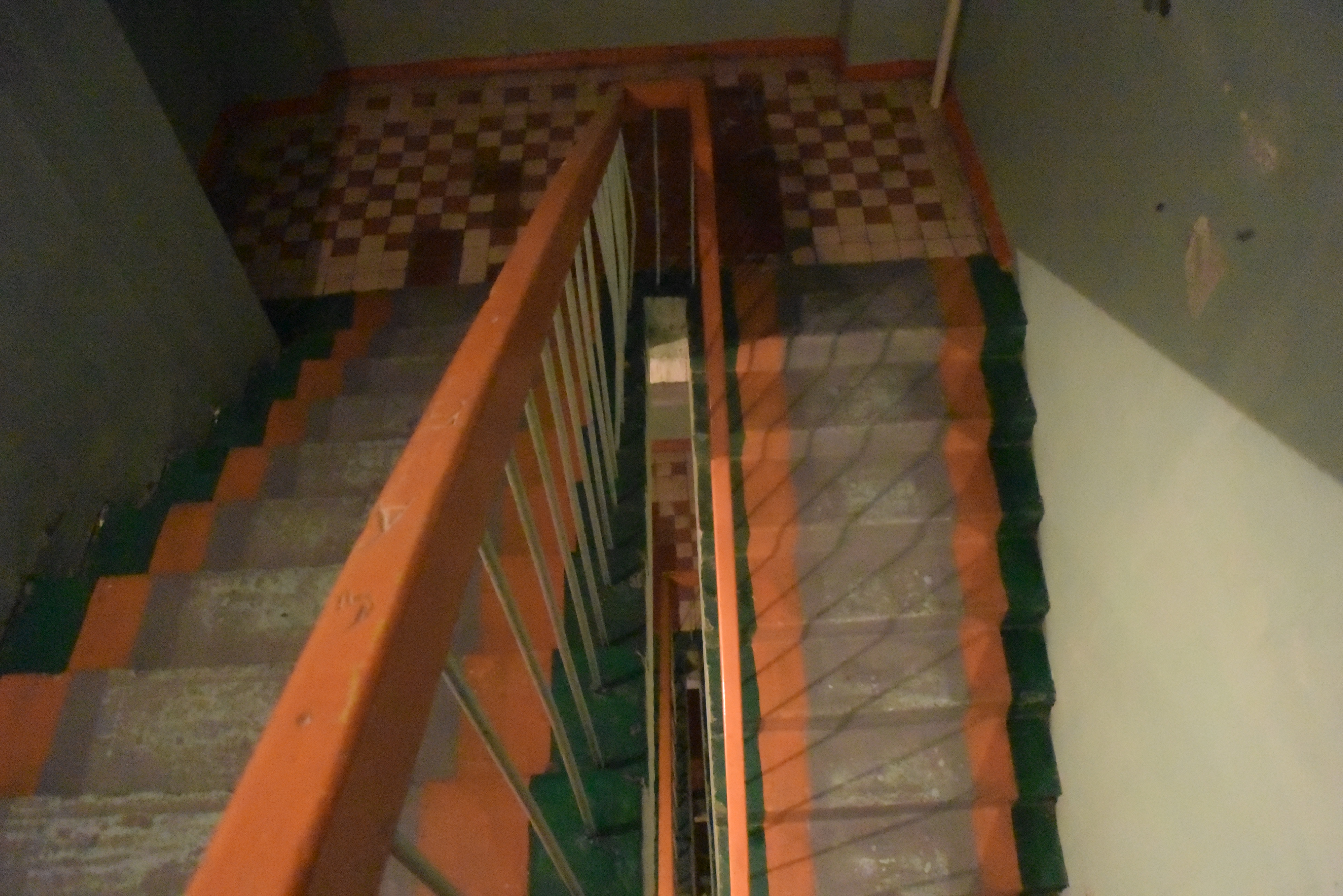 a staircase with orange and green steps