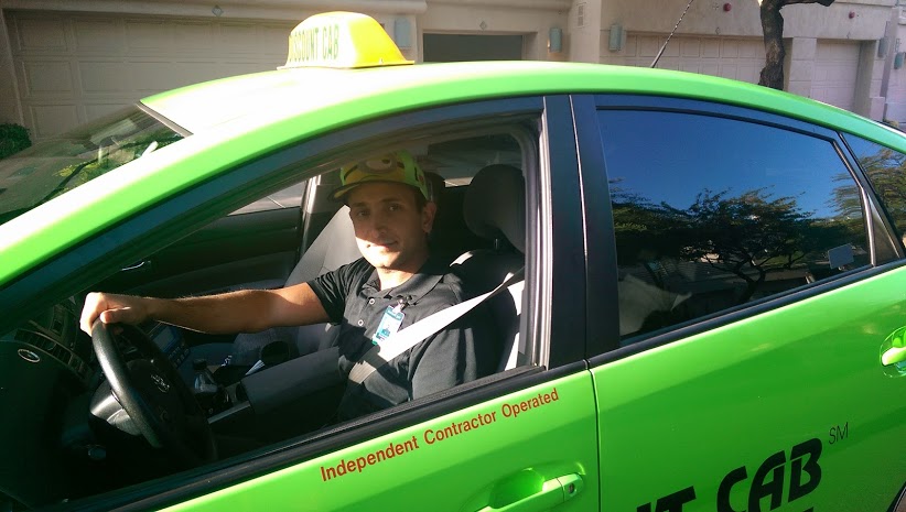 a man in a green car
