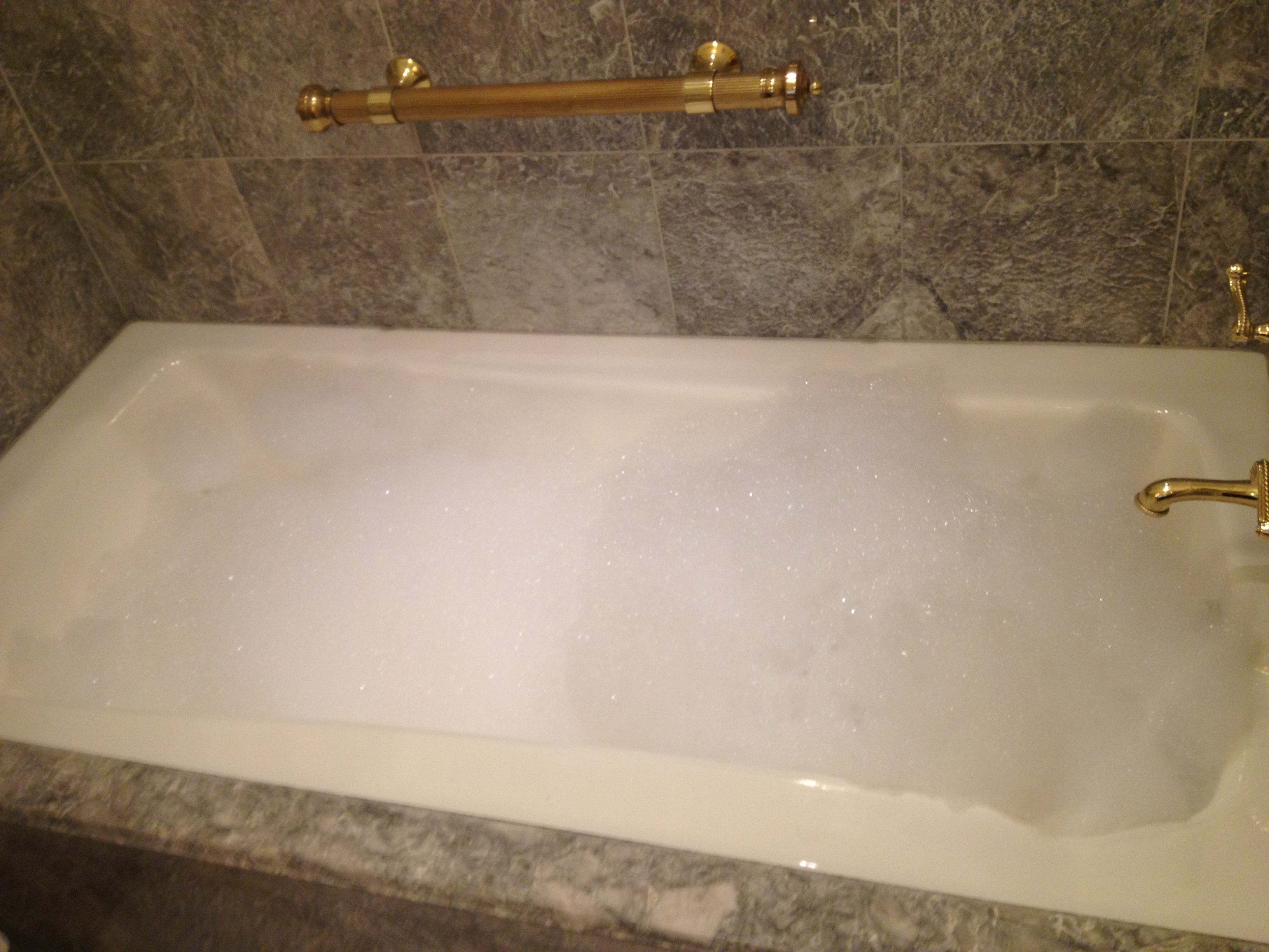 a bathtub with bubbles on it