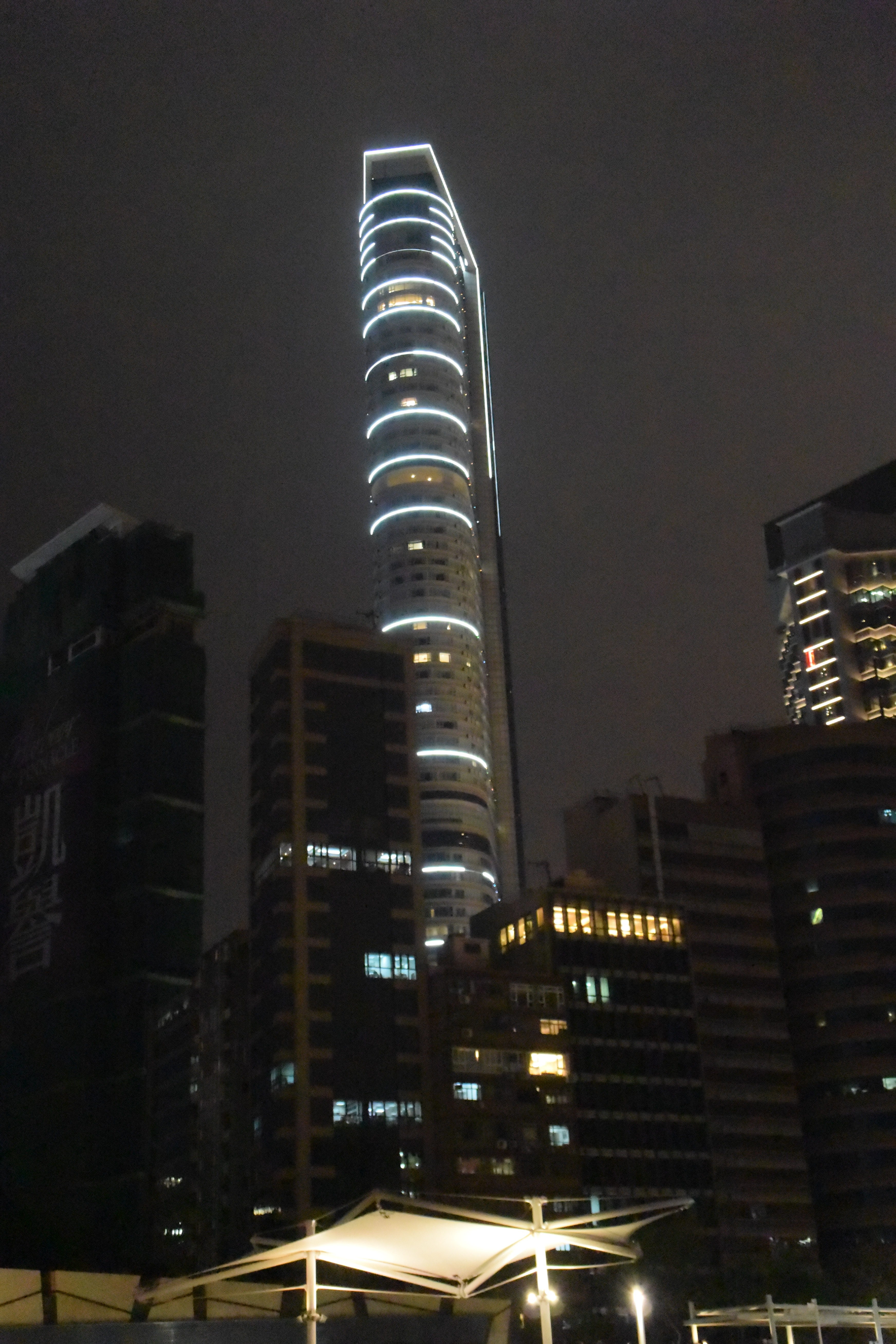 a tall building with lights on top